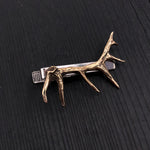 This defined 3D elk antler is cast in solid bronze, oxidized to enhance the fine details of this beautifully sculpted little carving. The 2-1/8"long high relief antler is mounted on a solid nickel plated tie clasp with an overall width 2".