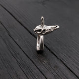My little unicorn skull ring is cast in solid silver plated bronze, oxidized in the recesses to show off the fine details. It measures a mere 15/16" (24mm) long and 3/8" (10mm) at its widest point.