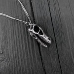 Black and white necklace photo with detailed skull pendant | Moon Raven