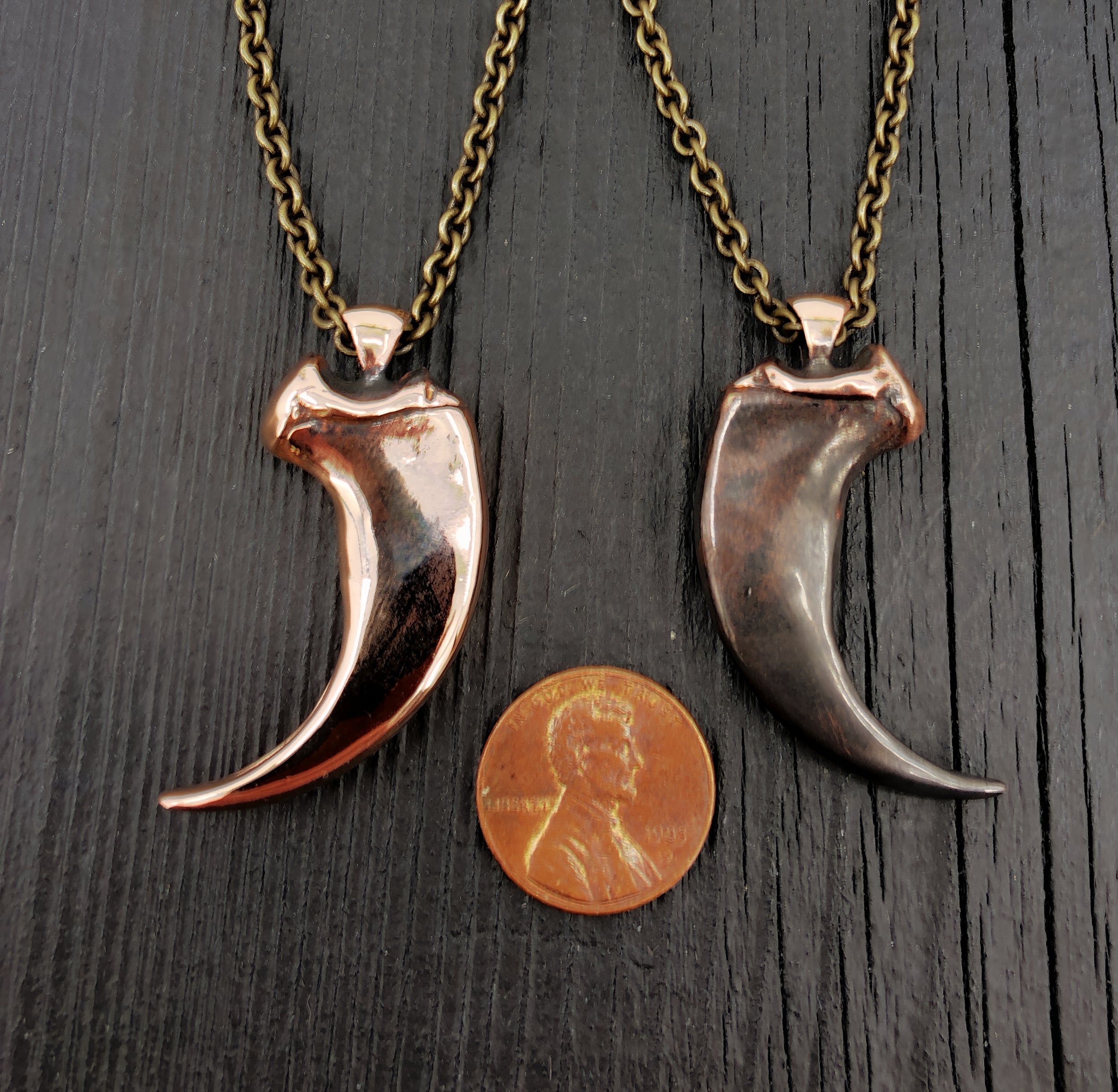 Two necklaces with penny on top, highlighting design | Moon Raven