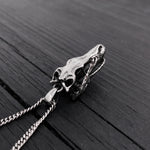 Silver necklace with detailed skull pendant, edgy gothic design
