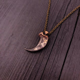 Large metal horn pendant on chain, sleek modern style | Moon Raven