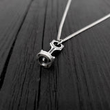 This piston and rod pendant measures 1” Long by 3/8&quot; wide. The precisely detailed 3D rod and piston are cast in one solid piece of sterling silver.