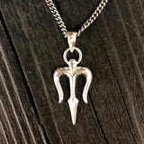 This solid sterling silver trident necklace is just the right size for both him or her measuring one inch long not including the tasteful triangle bail. It features a simple elegant design of the highest quality and is stamped .925 on the back.