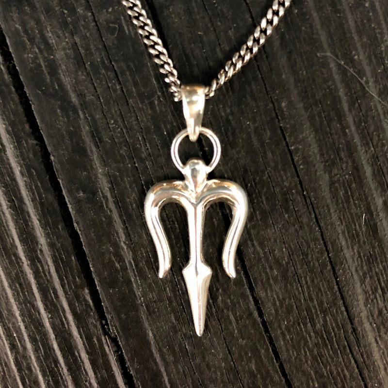 This solid sterling silver trident necklace is just the right size for both him or her measuring one inch long not including the tasteful triangle bail. It features a simple elegant design of the highest quality and is stamped .925 on the back.