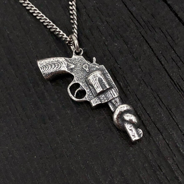 Sterling Silver Knotted Gun Pendant: Symbol of Peace and Non-Violence, Symbolic Jewelry,