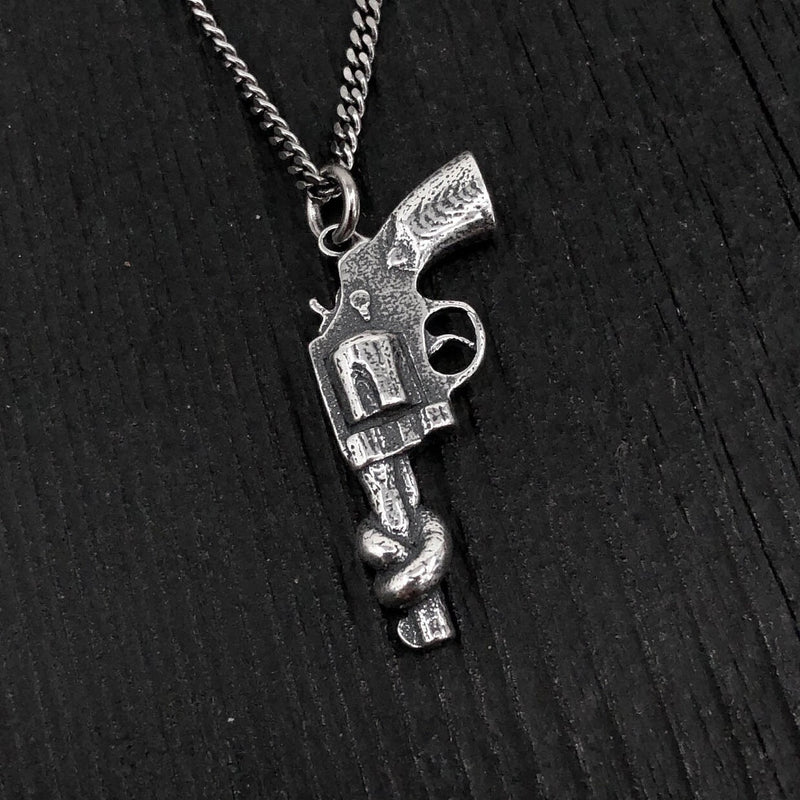 Sterling Silver Knotted Gun Pendant: Symbol of Peace and Non-Violence, Symbolic Jewelry,