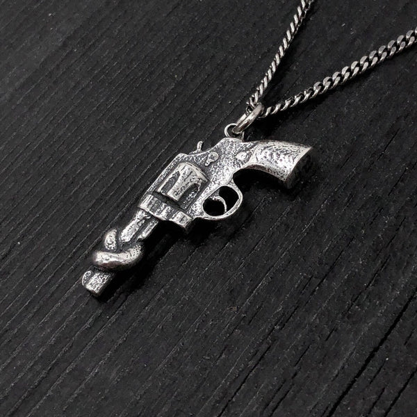 Sterling Silver Knotted Gun Pendant: Symbol of Peace and Non-Violence, Symbolic Jewelry,