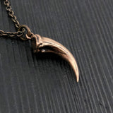 Velociraptor Claw Necklace - Solid Bronze Dinosaur Pendant by Moon Raven Designs